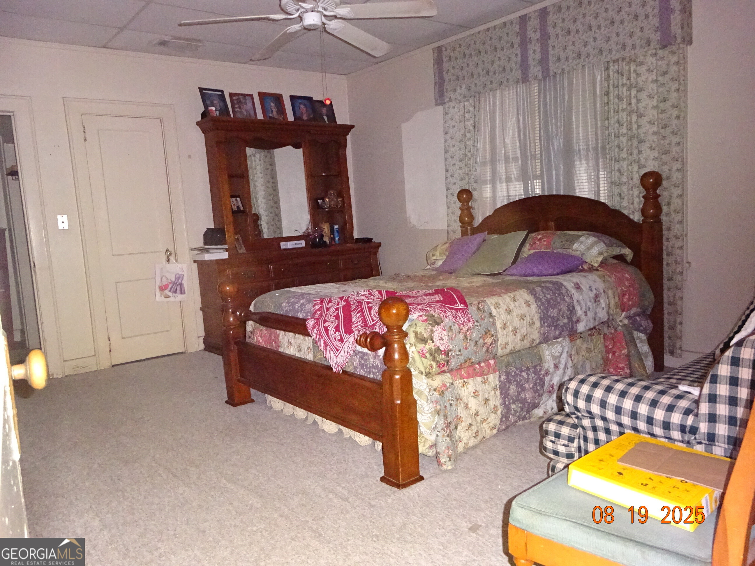 6 North Spring Street Claxton, GA 30417 - Photo 10 of 26 a bedroom with a bed and a couch