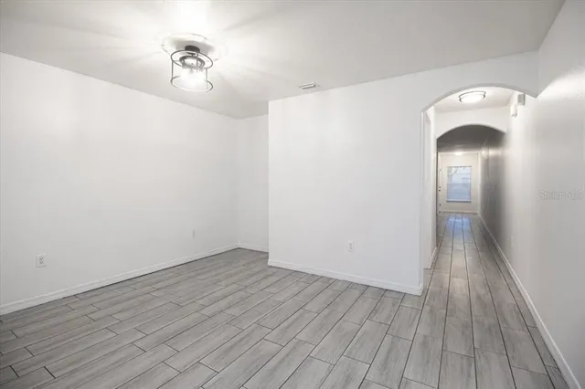 a view of a livingroom with wooden floor