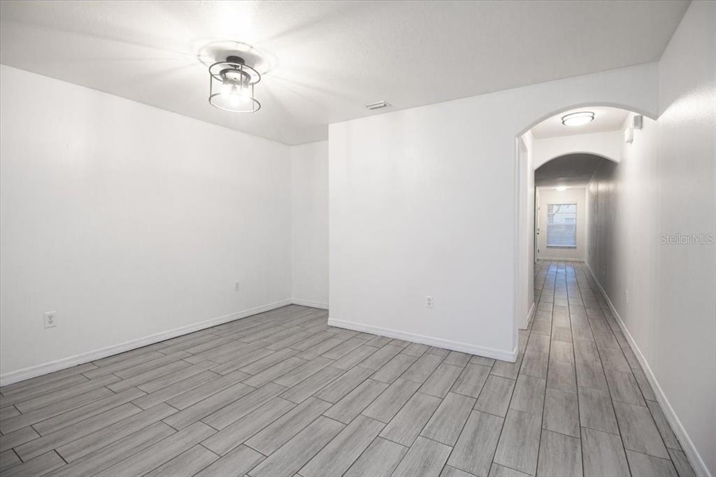 12946 Trade Port Place Riverview, FL 33579 - Photo 15 of 26 a view of a livingroom with wooden floor