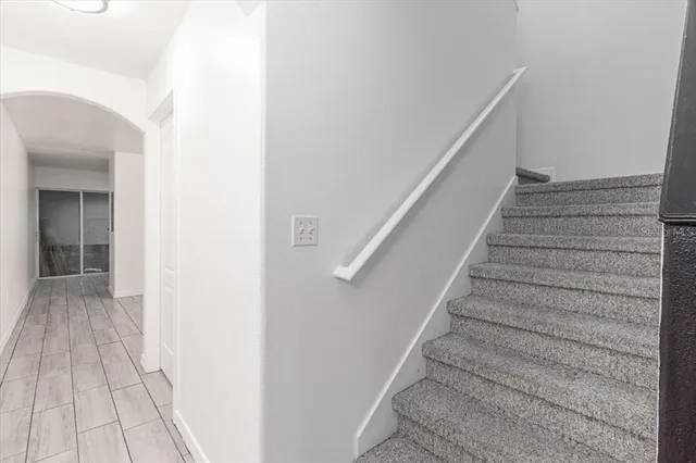 a view of entryway with wooden floor