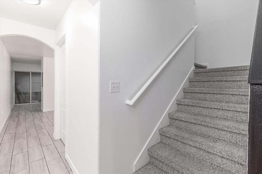 12946 Trade Port Place Riverview, FL 33579 - Photo 17 of 26 a view of entryway with wooden floor