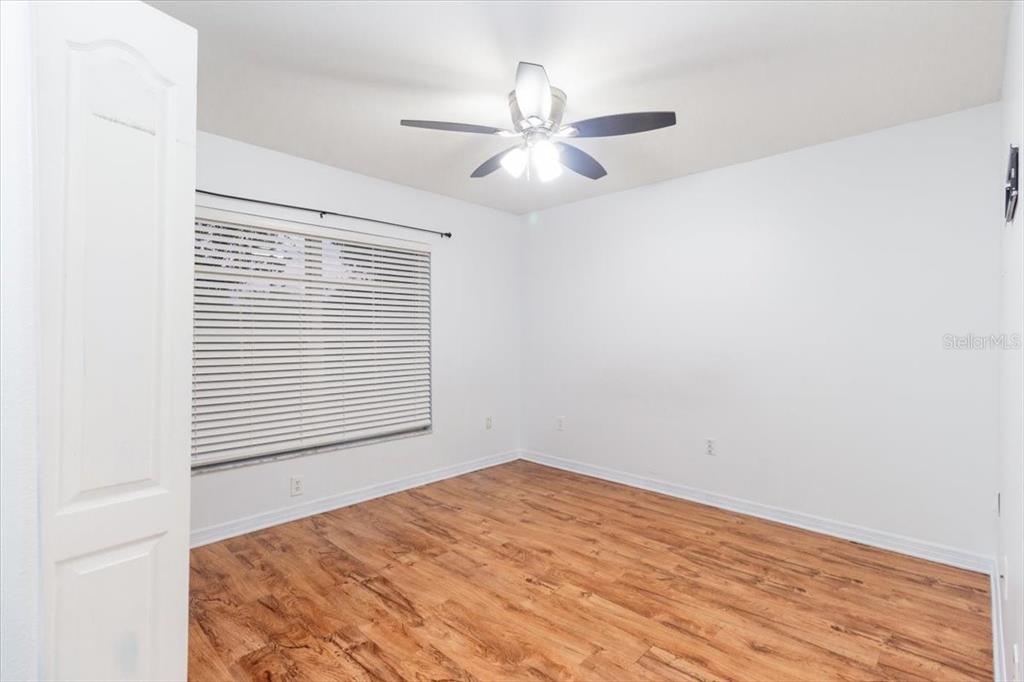 12946 Trade Port Place Riverview, FL 33579 - Photo 24 of 26 a view of an empty room with a window