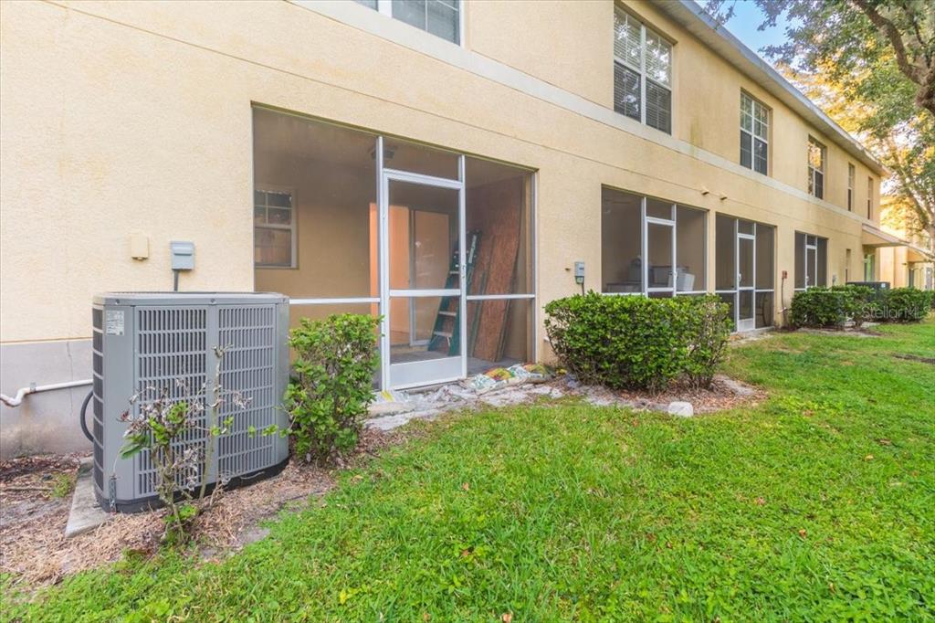 12946 Trade Port Place Riverview, FL 33579 - Photo 5 of 26 a house view with a garden space