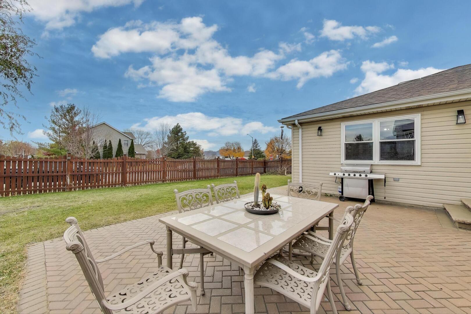 635 Huron Drive Romeoville, IL 60446 - Photo 25 of 32 a view of a patio with a yard
