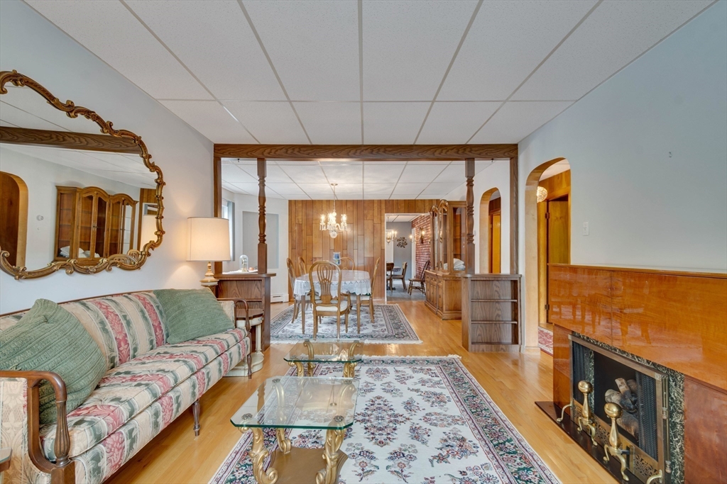 45 Jackson Road Somerville, MA 02145 - Photo 7 of 27 a living room with furniture and a flat screen tv
