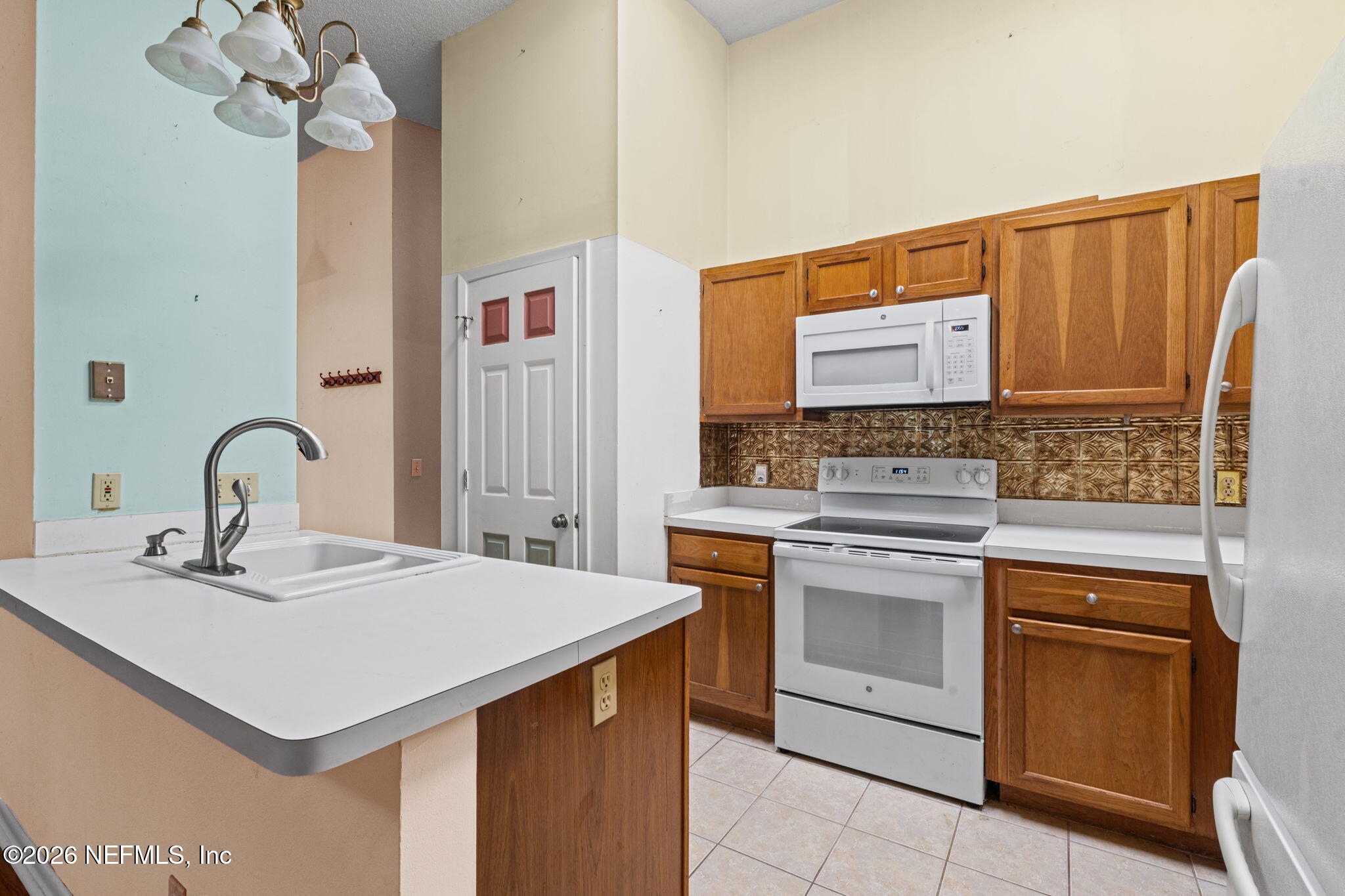 36 Navarra Court St. Augustine, FL 32086 - Photo 15 of 42 a kitchen with a sink cabinets and appliances