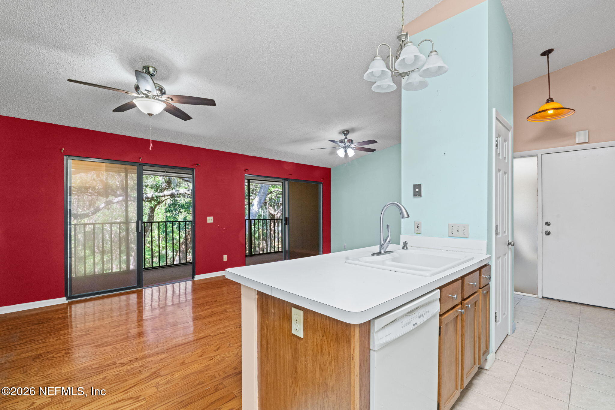 36 Navarra Court St. Augustine, FL 32086 - Photo 17 of 42 a view of a kitchen with a sink and chandelier