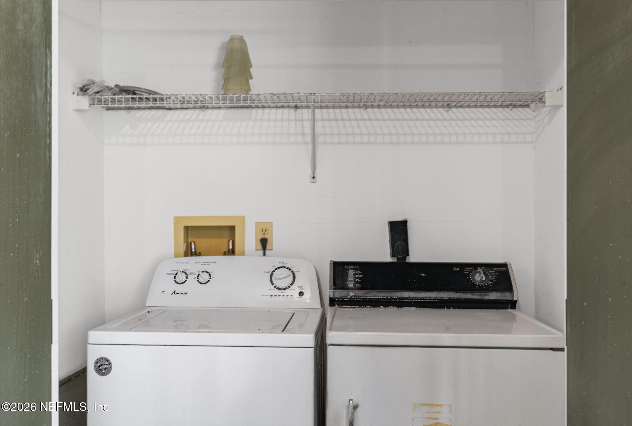 36 Navarra Court St. Augustine, FL 32086 - Photo 21 of 42 a close view of utility room with washer and dryer