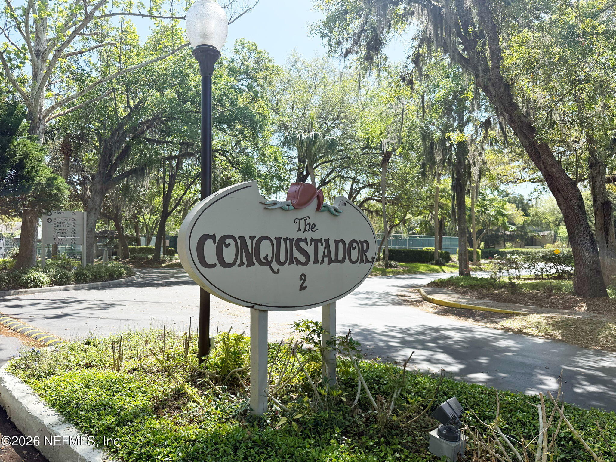 36 Navarra Court St. Augustine, FL 32086 - Photo 29 of 42 a view of a sign in a yard with tree s