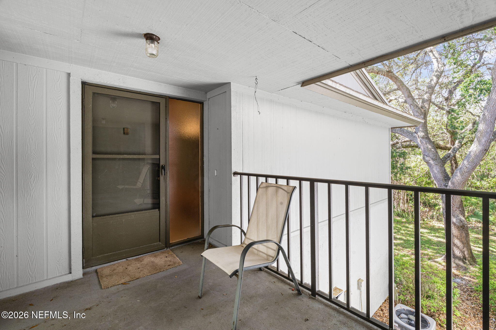 36 Navarra Court St. Augustine, FL 32086 - Photo 6 of 42 a view of a porch with wooden floor