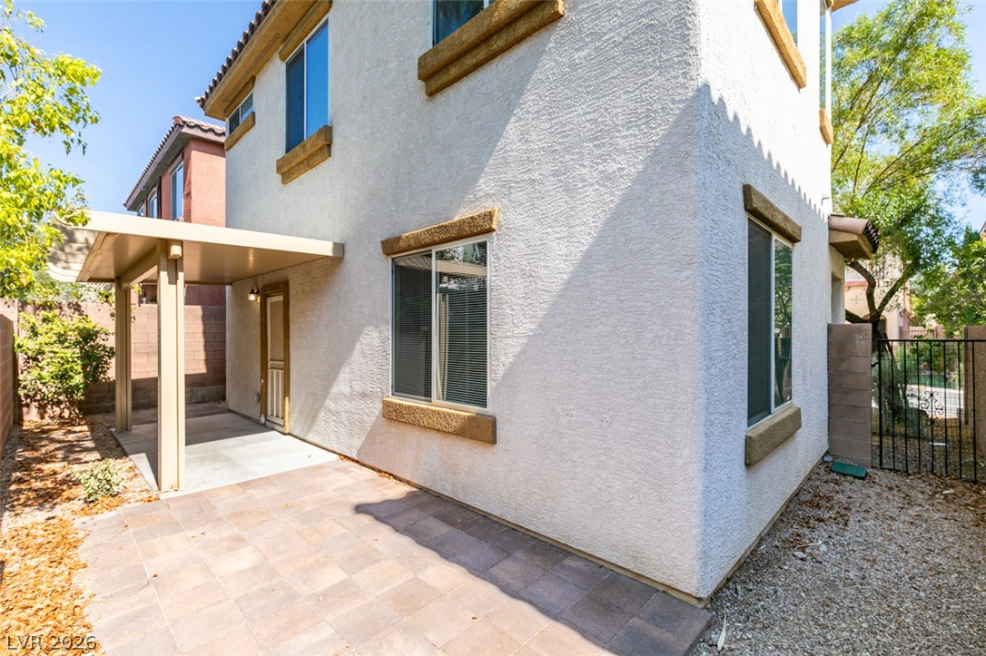 8937 Caledon Ridge Court Las Vegas, NV 89149 - Photo 42 of 43 A spacious paved patio offers ample outdoor living area, ready for personalization.