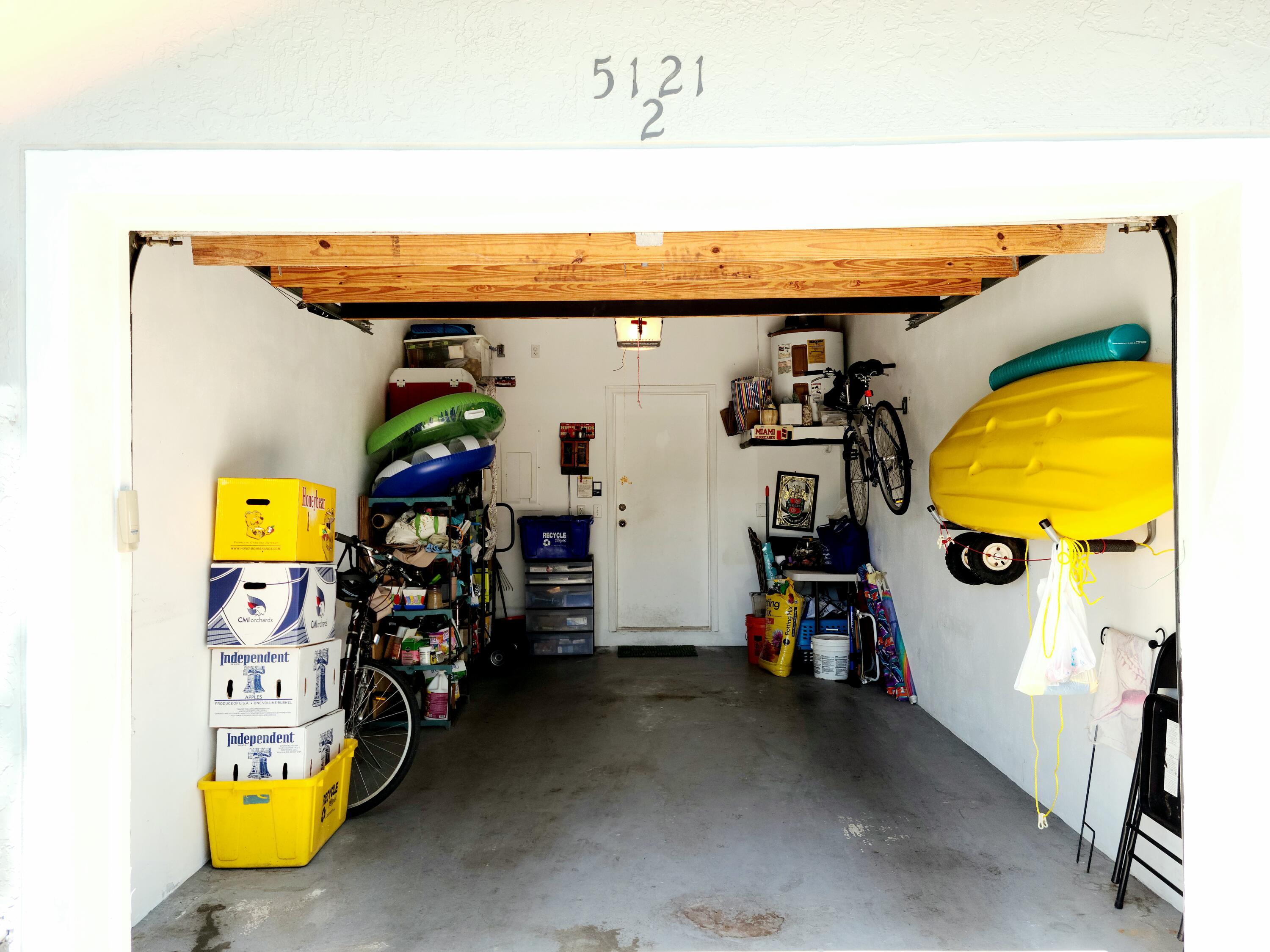 5121 Sabal Gardens Lane, Unit 2 Boca Raton, FL 33487 - Photo 23 of 25 a view of a room with gym equipment