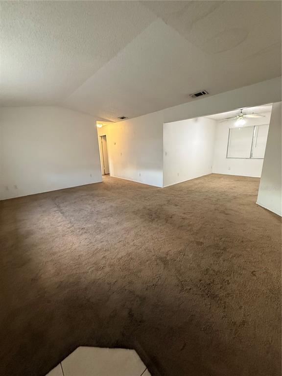 9007 Spring Hill Drive Spring Hill, FL 34608 - Photo 2 of 12 a view of a big room with toilet and a window