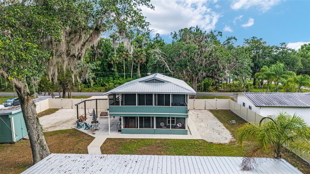 24628 Fox Road Astor, FL 32102 - Photo 4 of 96 a view of a house with a yard