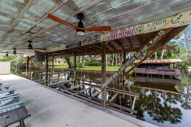a kitchen with stainless steel appliances a refrigerator and a stove top oven