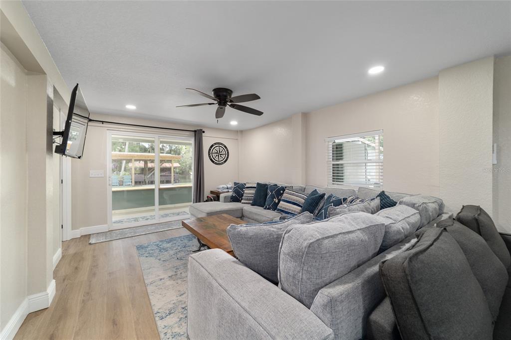 24628 Fox Road Astor, FL 32102 - Photo 57 of 96 a living room with furniture and a window