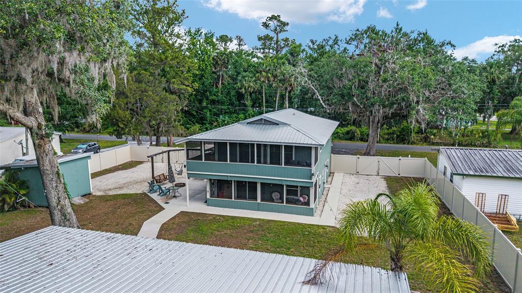 24628 Fox Road Astor, FL 32102 - Photo 6 of 96 a view of a house with a yard