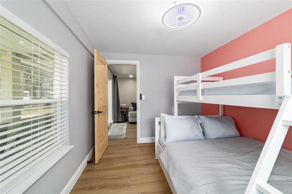 24628 Fox Road Astor, FL 32102 - Photo 65 of 96 a view of bedroom with furniture and a window