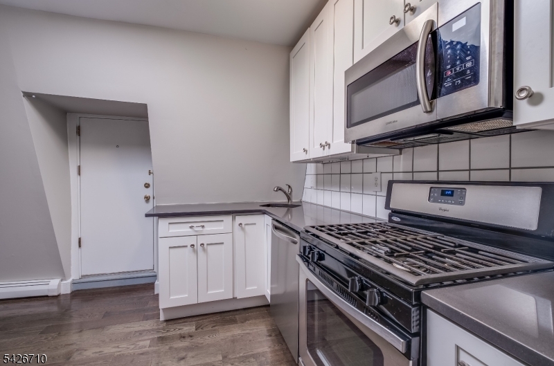 47 Ridgedale Avenue Morristown, NJ 07960 - Photo 12 of 14 a stove top oven sitting inside of a kitchen