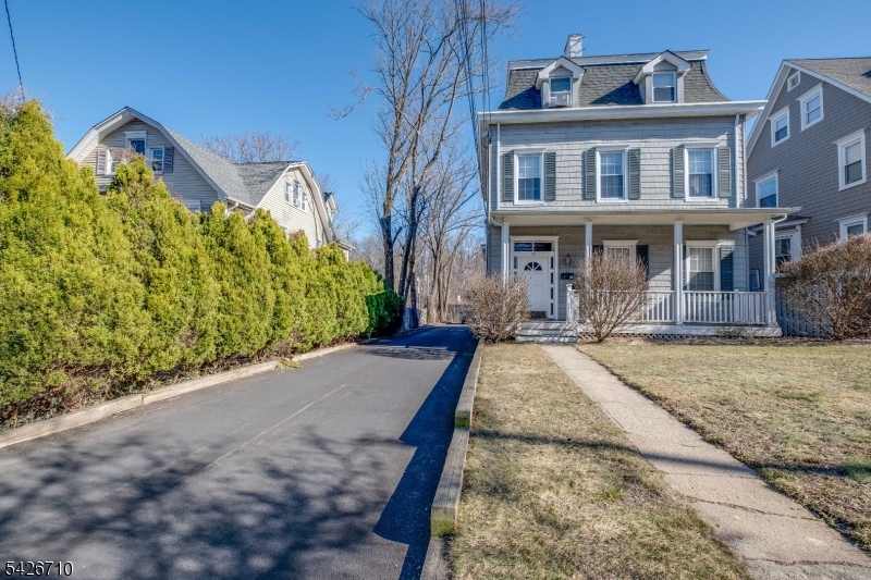 47 Ridgedale Avenue Morristown, NJ 07960 - Photo 2 of 14 a front view of a house with a yard