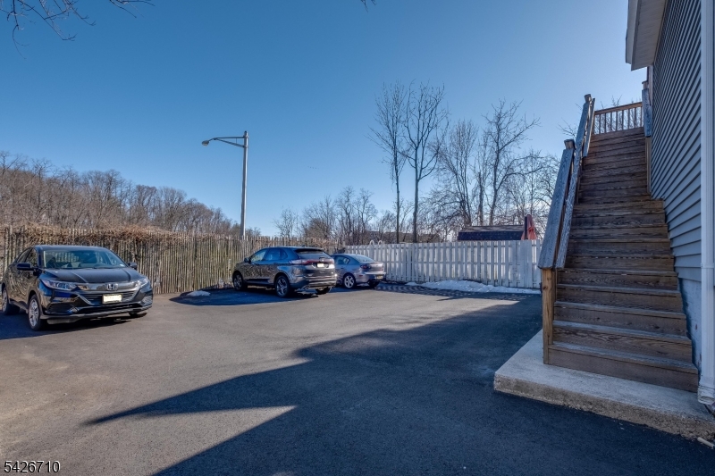 47 Ridgedale Avenue Morristown, NJ 07960 - Photo 3 of 14 a view of a cars park on the side of a road