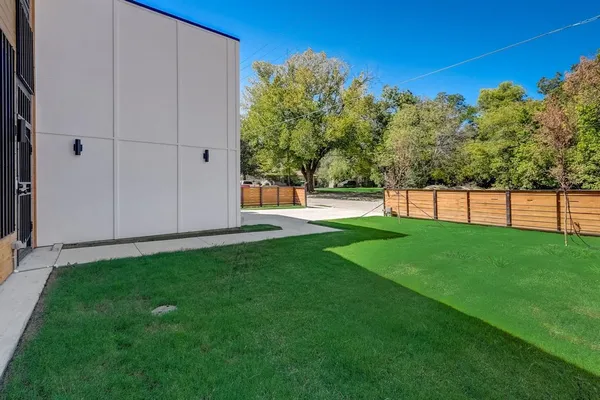 a view of a backyard with a garden