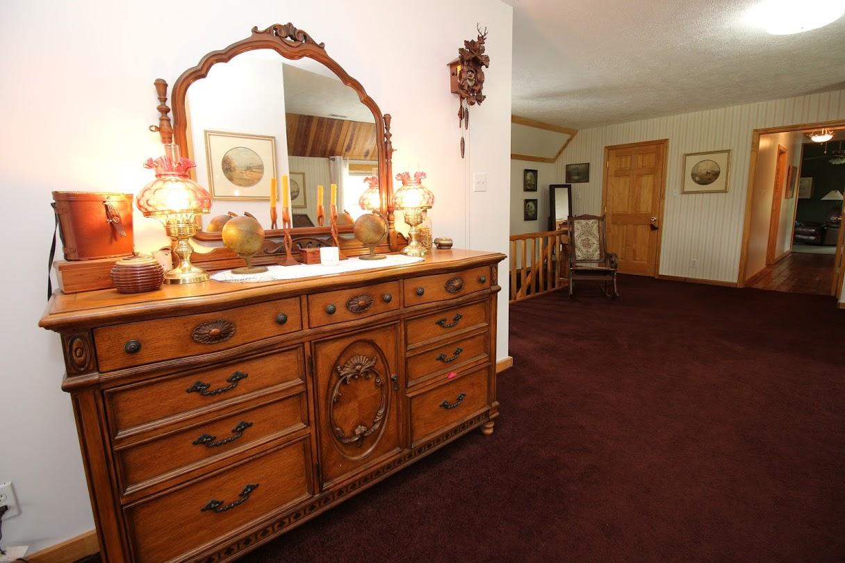 2185 Loops Road Rainelle, WV 25962 - Photo 11 of 109 a spacious bathroom with a double vanity sink and a mirror