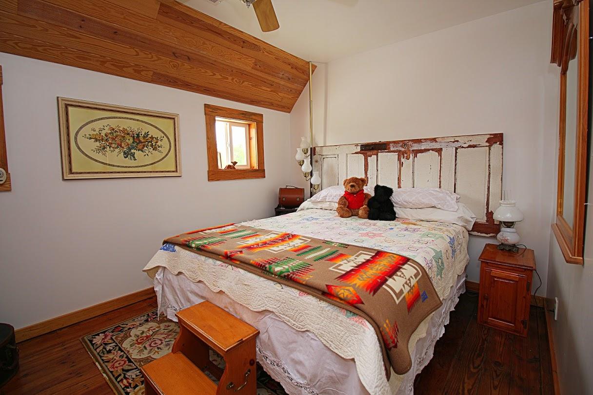 2185 Loops Road Rainelle, WV 25962 - Photo 14 of 109 a bedroom with bed and wooden floor
