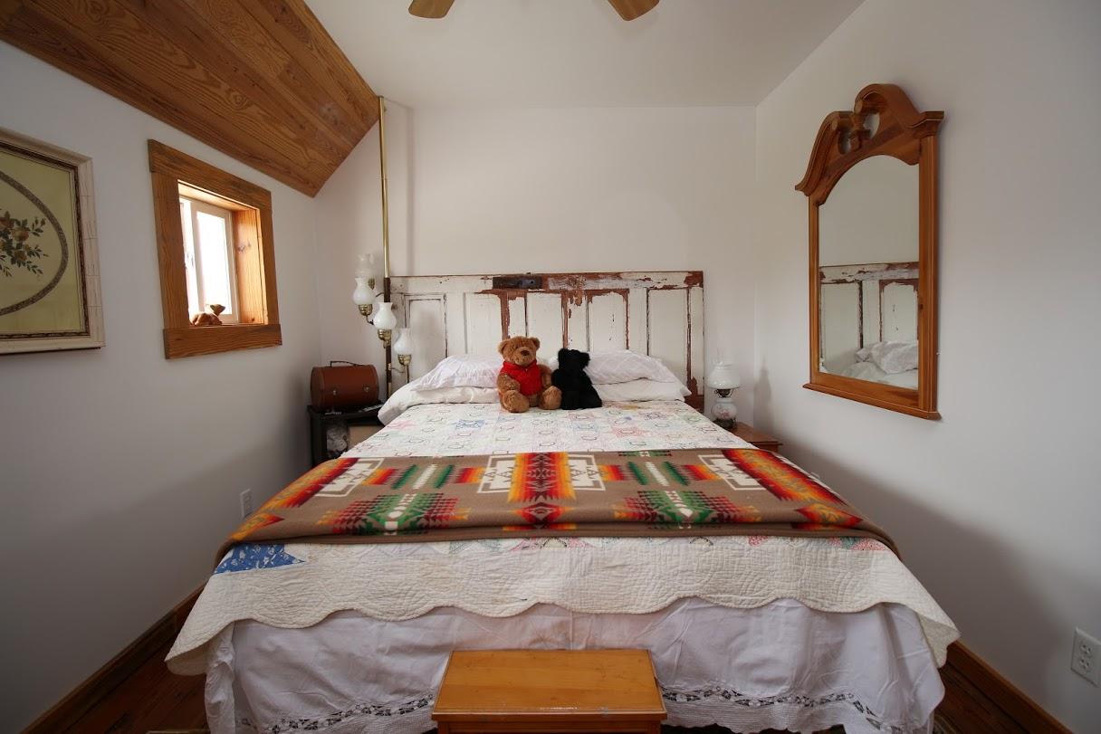 2185 Loops Road Rainelle, WV 25962 - Photo 15 of 109 a bedroom with a bed and window