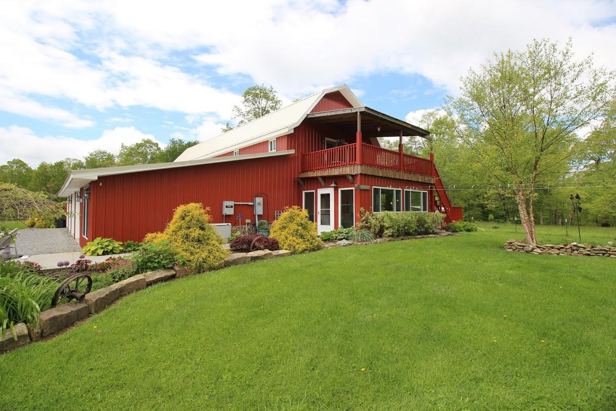 2185 Loops Road Rainelle, WV 25962 - Photo 23 of 109 a front view of a house with garden