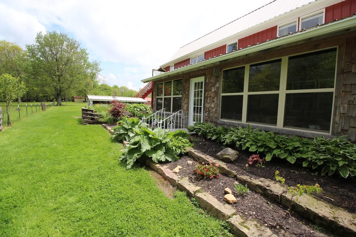 2185 Loops Road Rainelle, WV 25962 - Photo 30 of 109 a house with a garden
