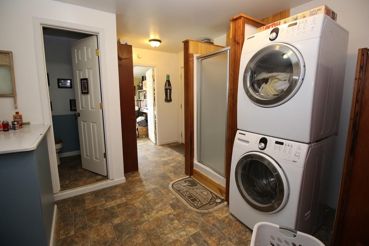 2185 Loops Road Rainelle, WV 25962 - Photo 35 of 109 a view of a hallway with washer and dryer