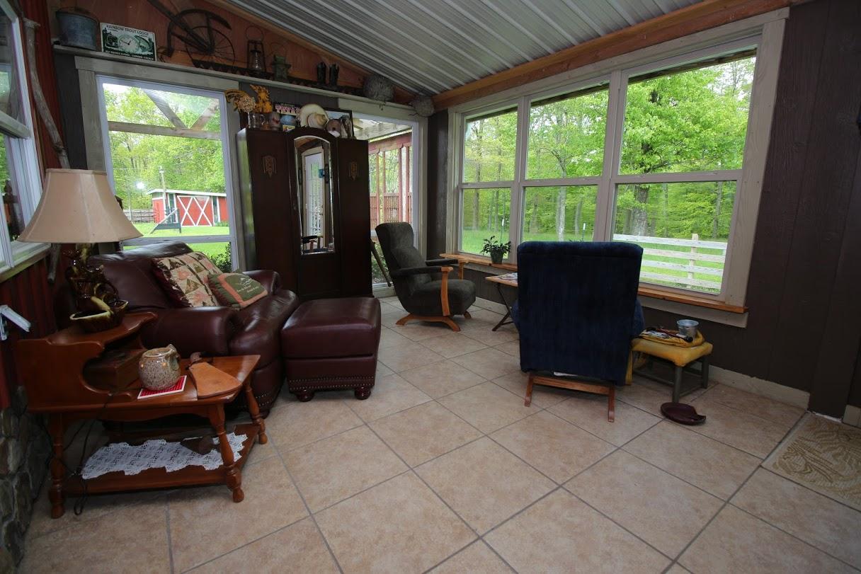 2185 Loops Road Rainelle, WV 25962 - Photo 39 of 109 a living room with furniture and a large window
