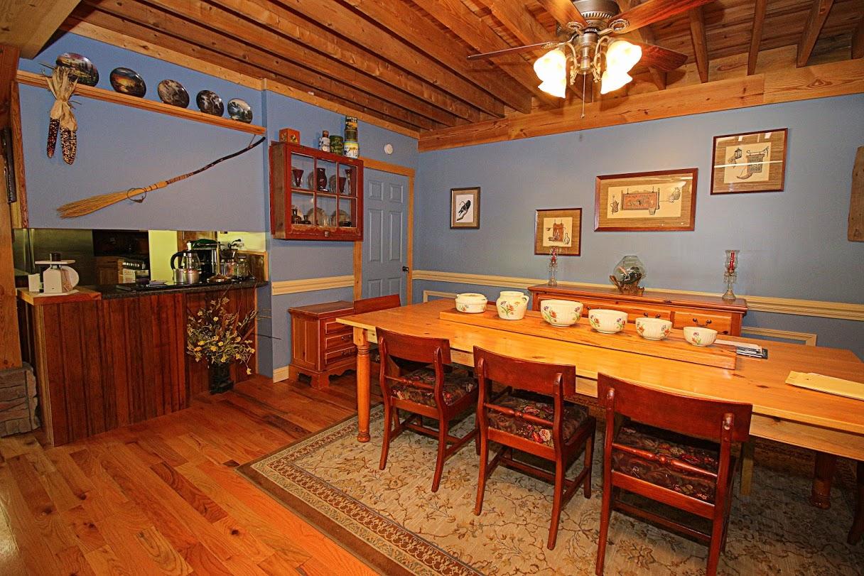 2185 Loops Road Rainelle, WV 25962 - Photo 5 of 109 a dining room with furniture and wooden floor