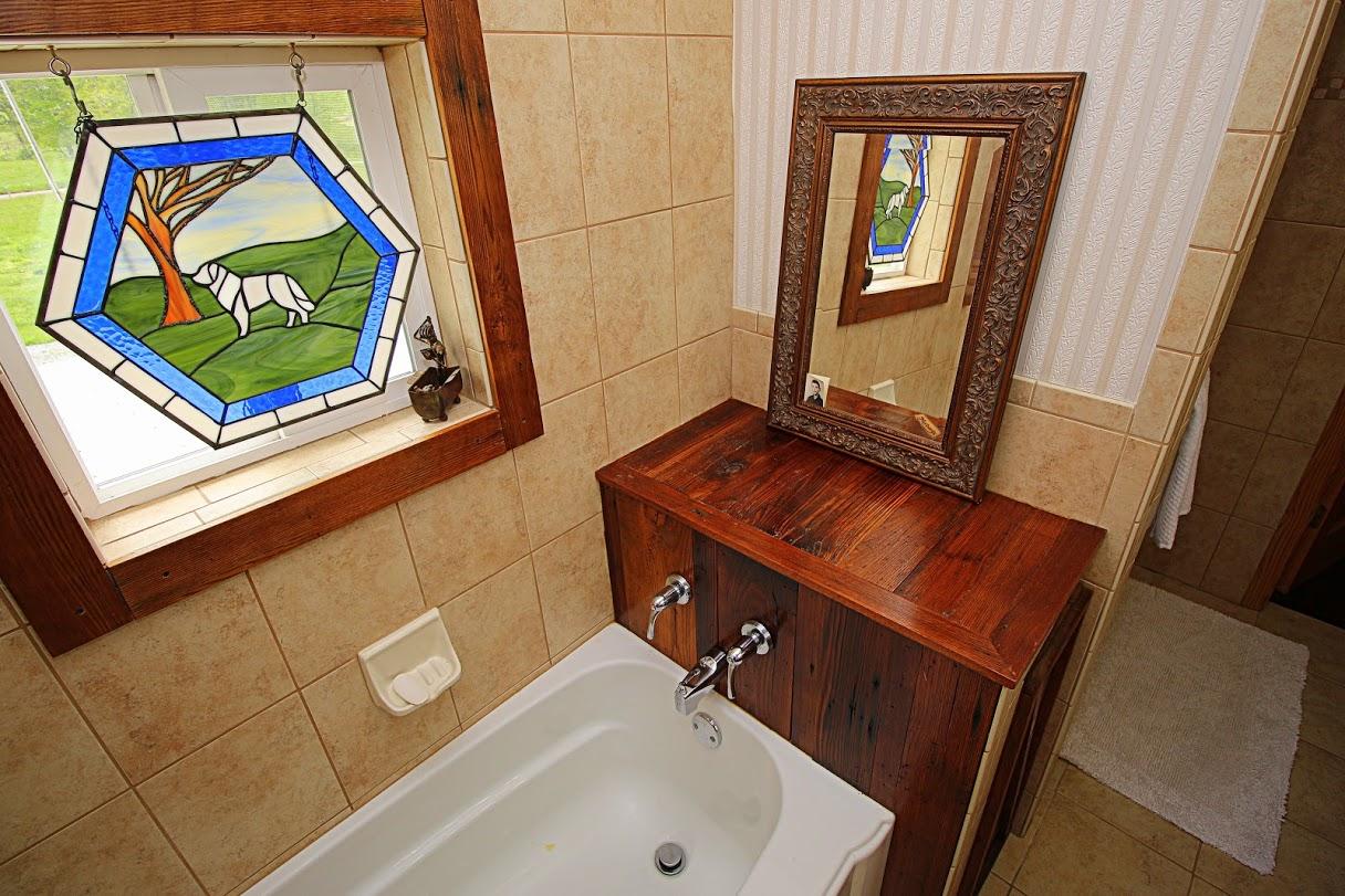 2185 Loops Road Rainelle, WV 25962 - Photo 44 of 109 a bathroom with a sink and a mirror