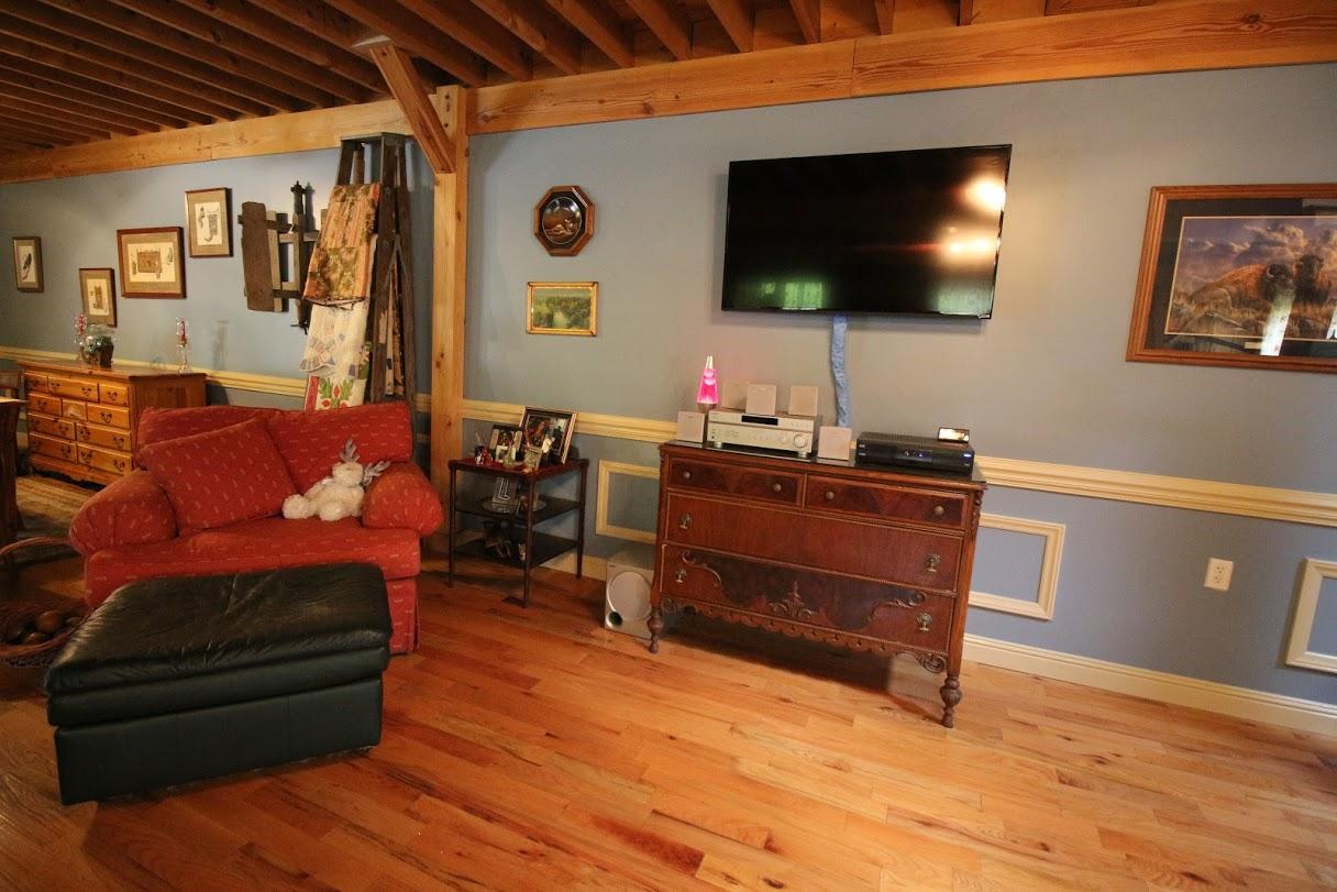 2185 Loops Road Rainelle, WV 25962 - Photo 54 of 109 a room with furniture and flat screen tv