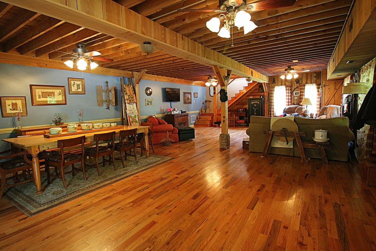 2185 Loops Road Rainelle, WV 25962 - Photo 61 of 109 a outdoor space with lots of furniture and wooden floor