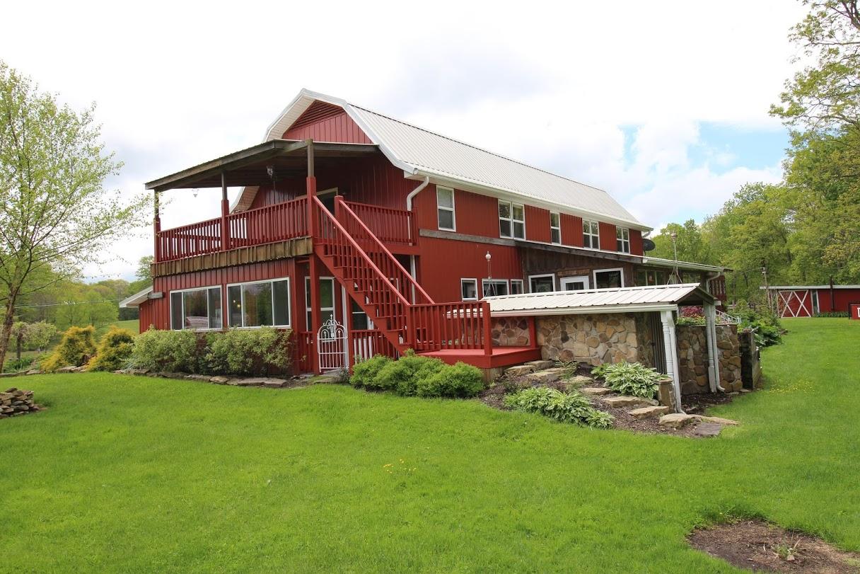 2185 Loops Road Rainelle, WV 25962 - Photo 70 of 109 a front view of a house with a yard