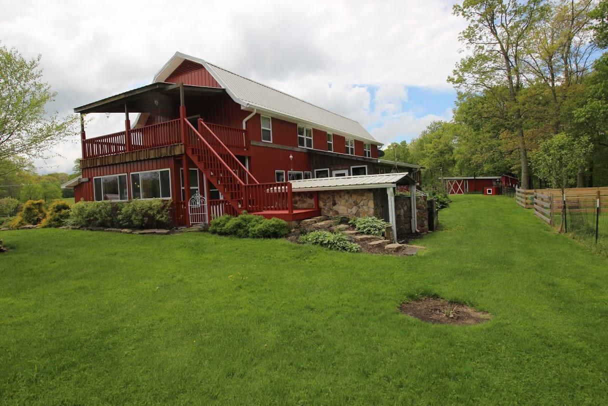 2185 Loops Road Rainelle, WV 25962 - Photo 71 of 109 a front view of house with garden