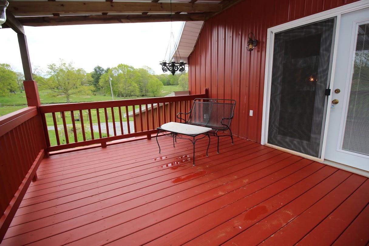 2185 Loops Road Rainelle, WV 25962 - Photo 92 of 109 a balcony with table and chairs