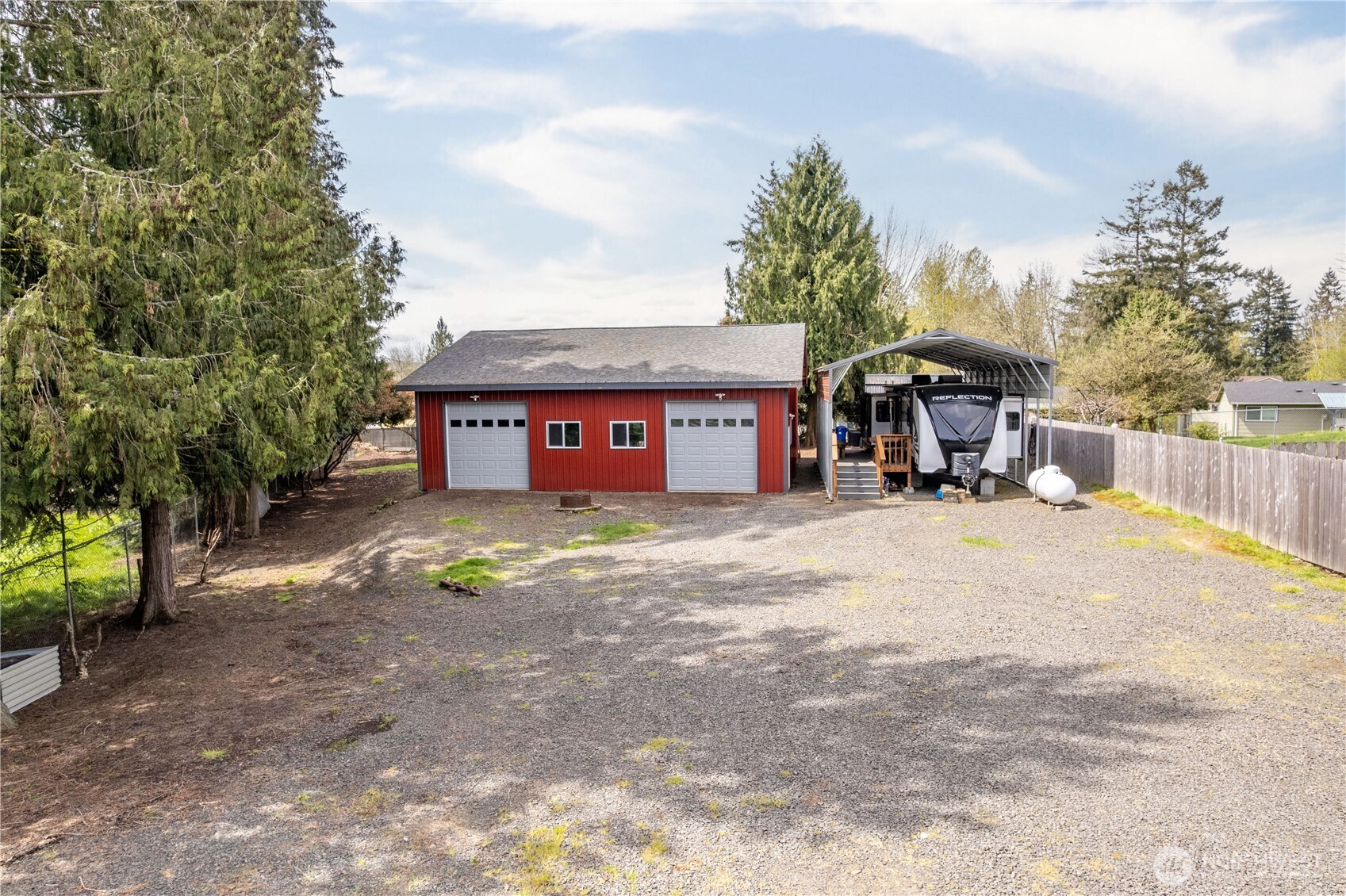 116 Mason Road Silverlake, WA 98645 - Photo 12 of 32 a view of a house with a yard and sitting area