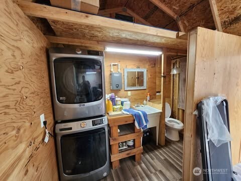 116 Mason Road Silverlake, WA 98645 - Photo 20 of 32 a room with furniture and wooden floor