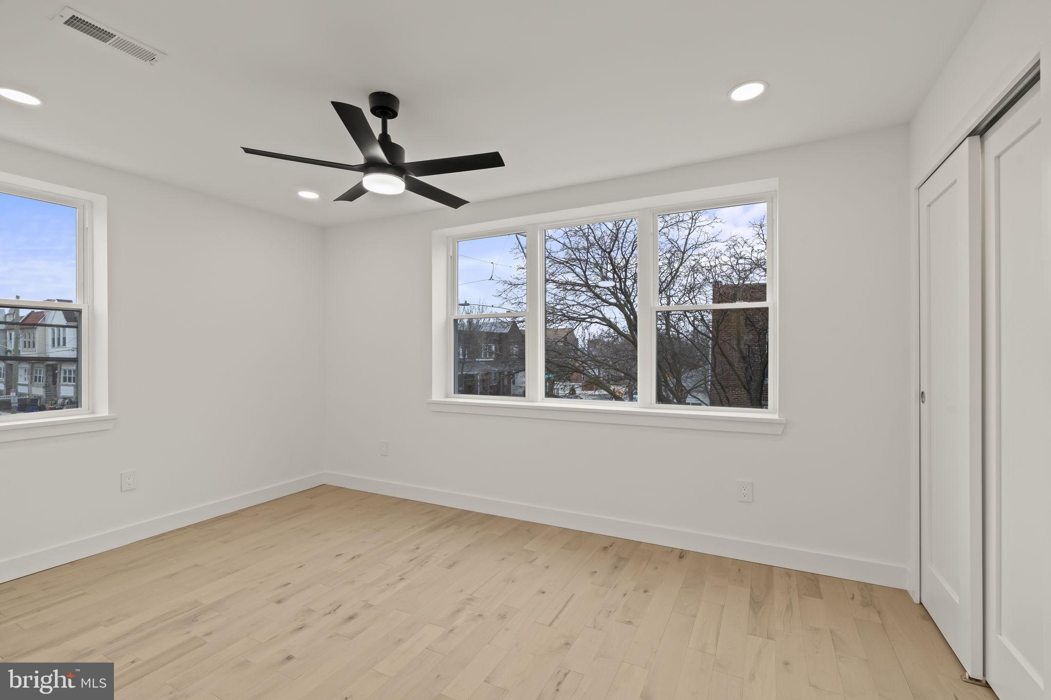 2747 South Beulah Street Philadelphia, PA 19148 - Photo 15 of 37 a view of an empty room with a window