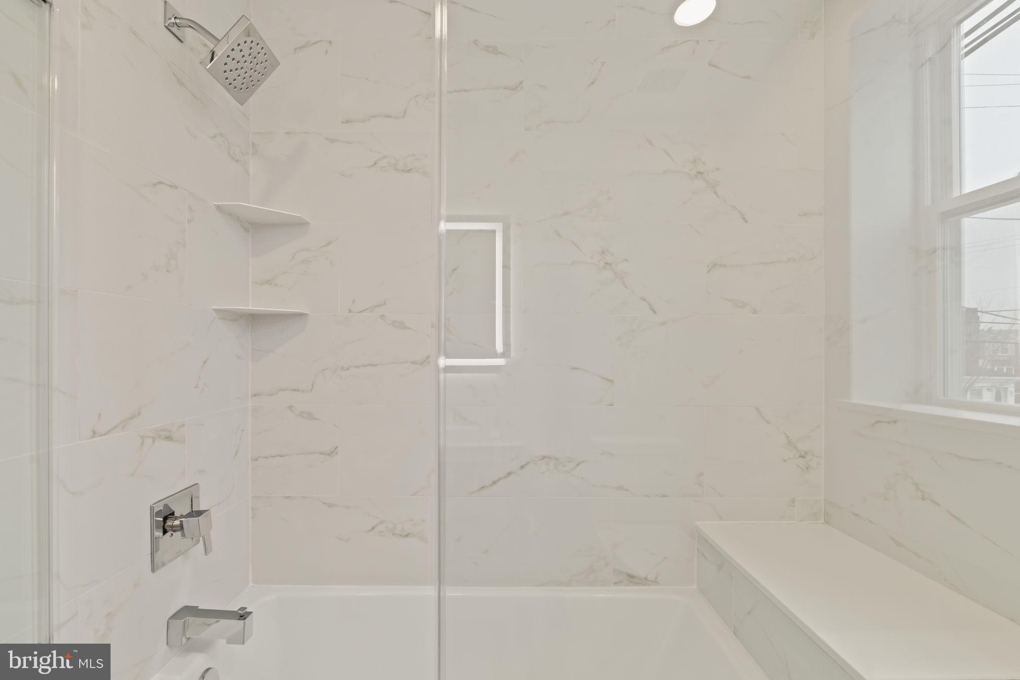 2747 South Beulah Street Philadelphia, PA 19148 - Photo 20 of 37 a close up of a bathtub curtain