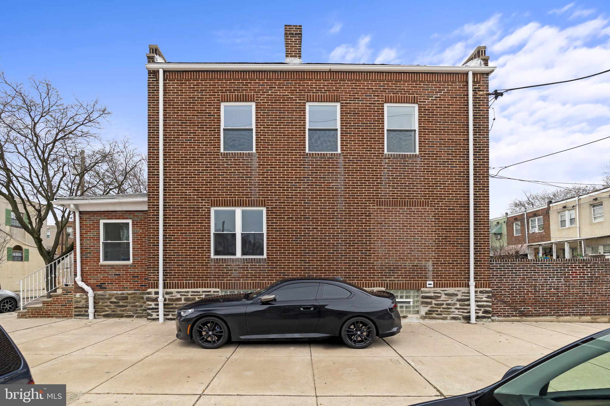 2747 South Beulah Street Philadelphia, PA 19148 - Photo 3 of 37 a car parked in front of a house