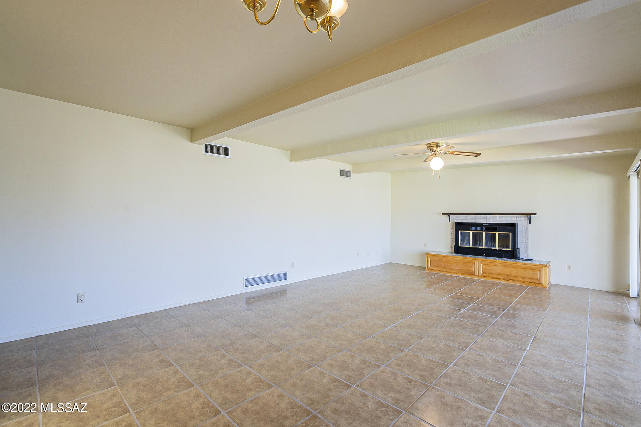 8951 East Bears Path Road Tucson, AZ 85749 - Photo 9 of 41 a view of empty room with a ceiling fan