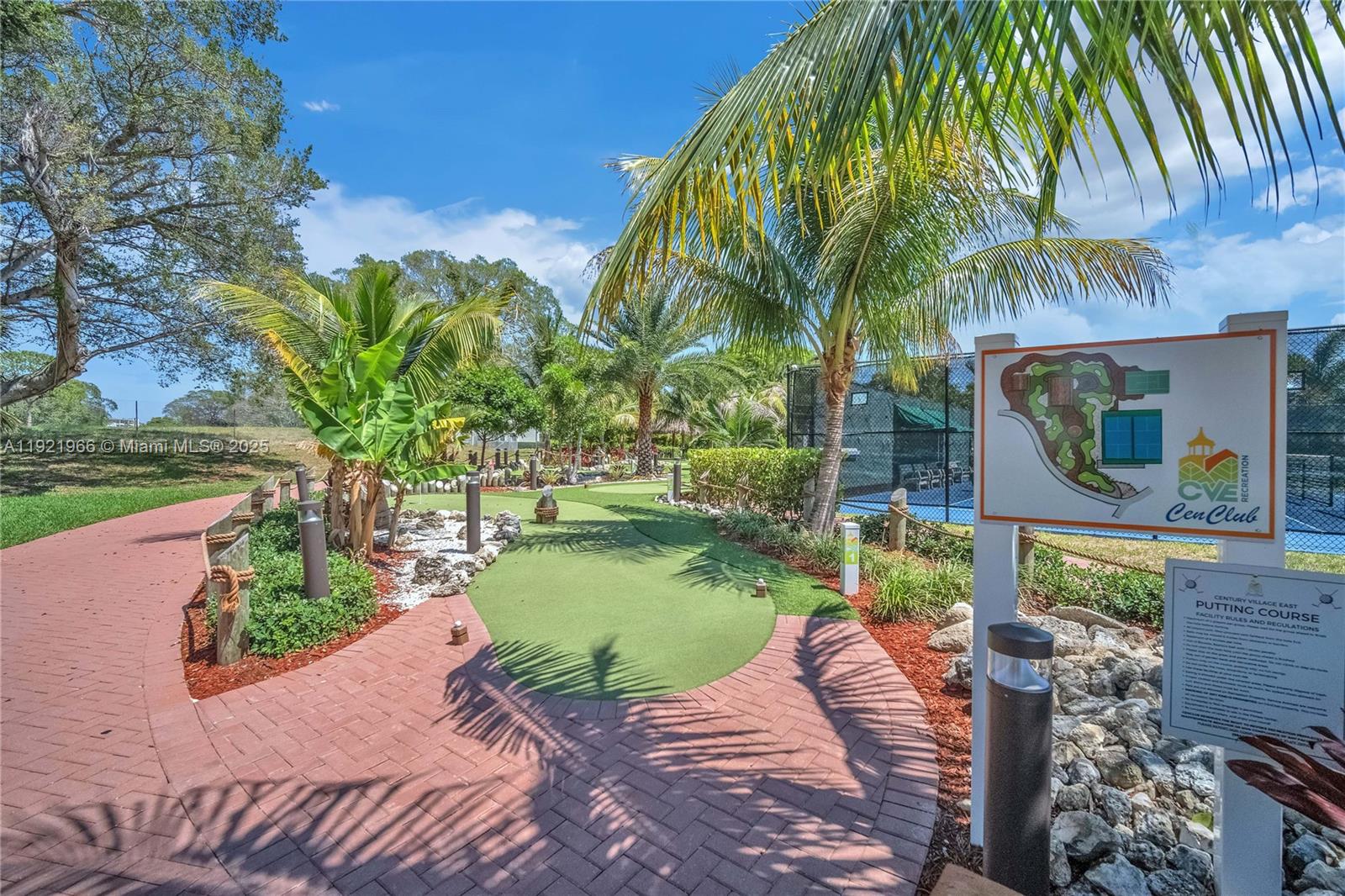 244 Durham, Unit 244 Deerfield Beach, FL 33442 - Photo 14 of 20 a view of backyard of house with green space