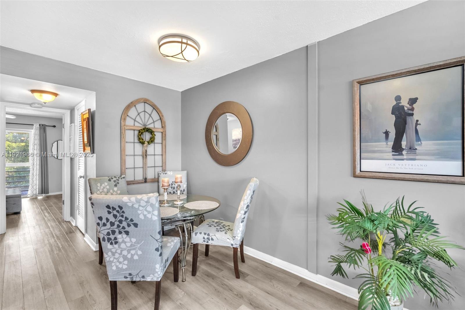 244 Durham, Unit 244 Deerfield Beach, FL 33442 - Photo 4 of 20 a view of a dining room with furniture and wooden floor