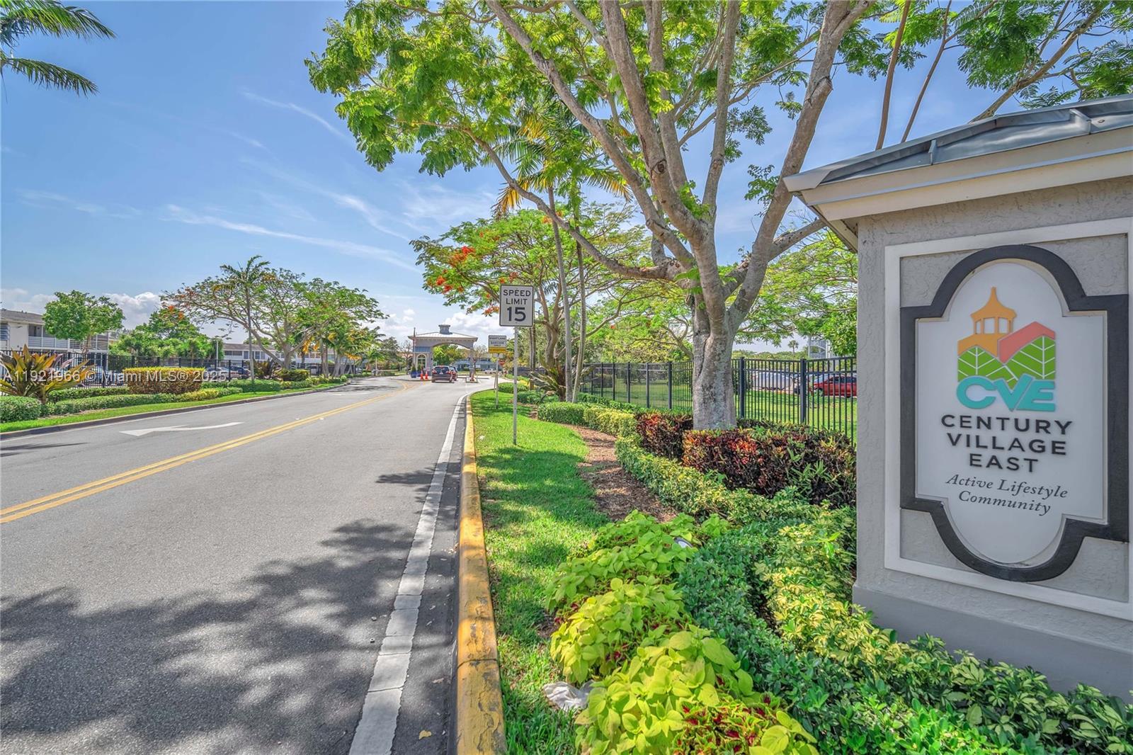 244 Durham, Unit 244 Deerfield Beach, FL 33442 - Photo 9 of 20 a view of a entrance gate of the house and a street view