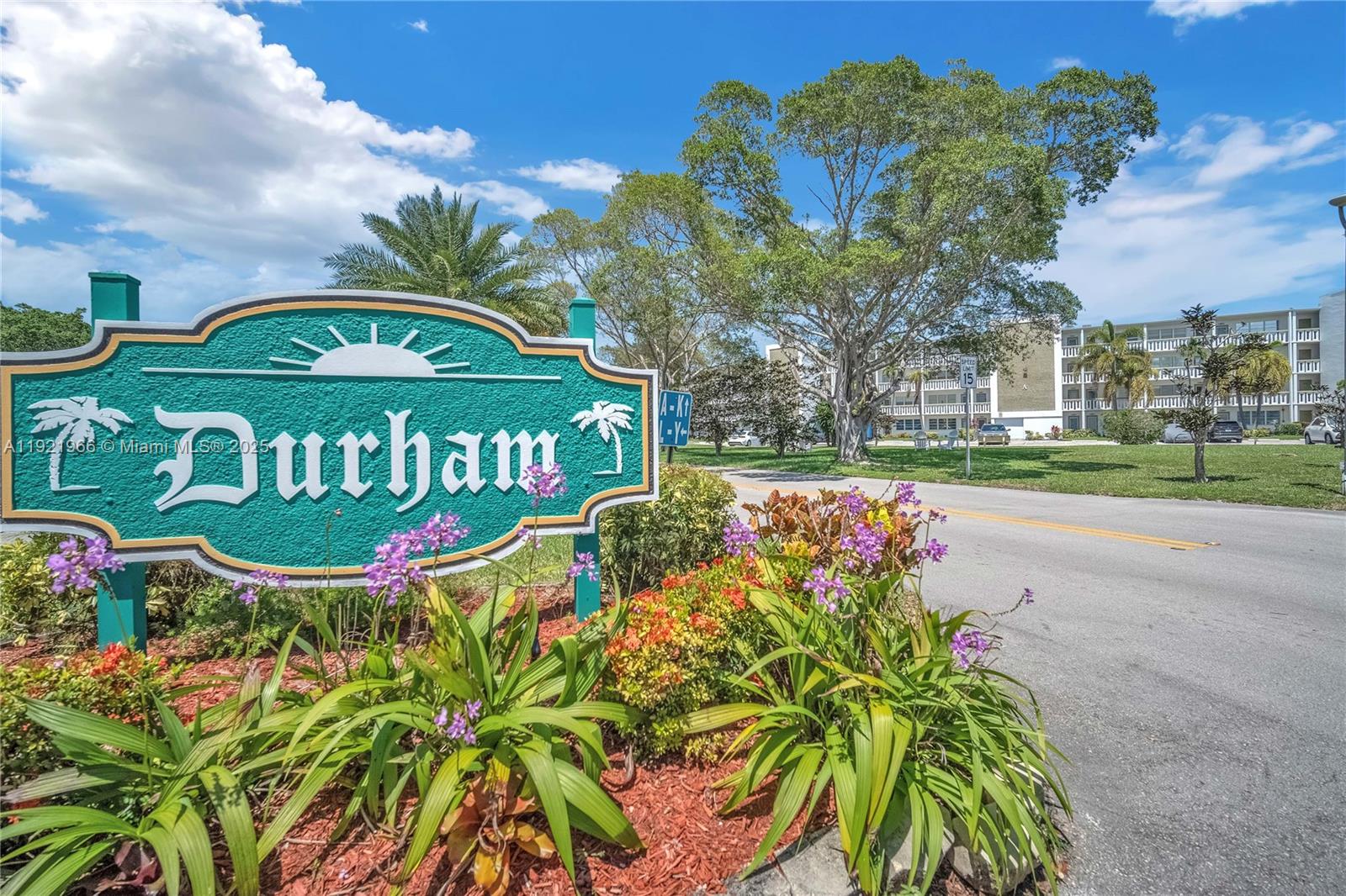 244 Durham, Unit 244 Deerfield Beach, FL 33442 - Photo 10 of 20 a sign that is on the side of the road